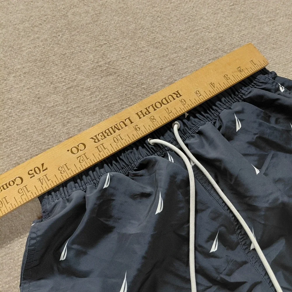Nautica Men's Swim‎ Trunks Navy Blue All Over Logo Size MEDIUM Pockets Lined